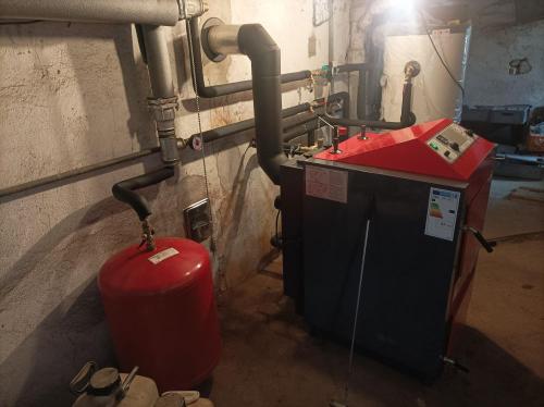 Likvidace starého kotle a instalace nového topného zařízení - Toušice 